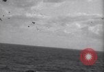 Image of Japanese kamikaze aircraft attacking US Navy ships Pacific Ocean, 1945, second 15 stock footage video 65675034755