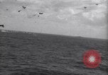 Image of Japanese kamikaze aircraft attacking US Navy ships Pacific Ocean, 1945, second 18 stock footage video 65675034755