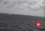 Image of Japanese kamikaze aircraft attacking US Navy ships Pacific Ocean, 1945, second 19 stock footage video 65675034755