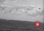 Image of Japanese kamikaze aircraft attacking US Navy ships Pacific Ocean, 1945, second 20 stock footage video 65675034755