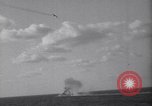 Image of Japanese kamikaze aircraft attacking US Navy ships Pacific Ocean, 1945, second 34 stock footage video 65675034755