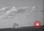 Image of Japanese kamikaze aircraft attacking US Navy ships Pacific Ocean, 1945, second 35 stock footage video 65675034755