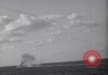 Image of Japanese kamikaze aircraft attacking US Navy ships Pacific Ocean, 1945, second 36 stock footage video 65675034755