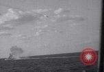 Image of Japanese kamikaze aircraft attacking US Navy ships Pacific Ocean, 1945, second 37 stock footage video 65675034755