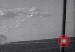 Image of Japanese kamikaze aircraft attacking US Navy ships Pacific Ocean, 1945, second 38 stock footage video 65675034755