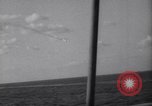 Image of Japanese kamikaze aircraft attacking US Navy ships Pacific Ocean, 1945, second 40 stock footage video 65675034755