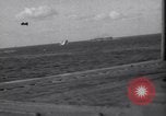 Image of Japanese kamikaze aircraft attacking US Navy ships Pacific Ocean, 1945, second 48 stock footage video 65675034755