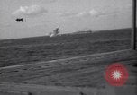 Image of Japanese kamikaze aircraft attacking US Navy ships Pacific Ocean, 1945, second 49 stock footage video 65675034755