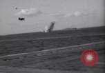 Image of Japanese kamikaze aircraft attacking US Navy ships Pacific Ocean, 1945, second 51 stock footage video 65675034755