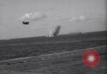 Image of Japanese kamikaze aircraft attacking US Navy ships Pacific Ocean, 1945, second 52 stock footage video 65675034755