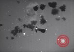 Image of Japanese kamikaze aircraft attacking US Navy ships Pacific Ocean, 1945, second 57 stock footage video 65675034755