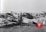 Image of U.S. fliers inspect airplanes on Air Memorial Day Hollywood California USA, 1919, second 14 stock footage video 65675034839