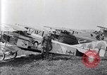 Image of U.S. fliers inspect airplanes on Air Memorial Day Hollywood California USA, 1919, second 16 stock footage video 65675034839