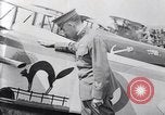 Image of U.S. fliers inspect airplanes on Air Memorial Day Hollywood California USA, 1919, second 22 stock footage video 65675034839
