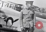 Image of U.S. fliers inspect airplanes on Air Memorial Day Hollywood California USA, 1919, second 26 stock footage video 65675034839