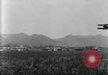 Image of U.S. fliers inspect airplanes on Air Memorial Day Hollywood California USA, 1919, second 37 stock footage video 65675034839
