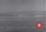 Standbild P-38 Flugzeuge zurück und Land Algerien Nordafrika, 1943, aus Sekunde 21 historischem Filmmaterial Videoclip 65675034875