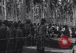 Standbild japanischen Gefangenen hinter Stacheldraht Gehäuse Guadalcanal Salomonen, 1942, aus Sekunde 3 historischem Filmmaterial Videoclip 65675034877
