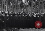 Standbild japanischen Gefangenen hinter Stacheldraht Gehäuse Guadalcanal Salomonen, 1942, aus Sekunde 12 historischem Filmmaterial Videoclip 65675034877