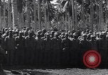Standbild japanischen Gefangenen hinter Stacheldraht Gehäuse Guadalcanal Salomonen, 1942, aus Sekunde 14 historischem Filmmaterial Videoclip 65675034877