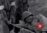 Image of wounded soldier of 8th Infantry Division Brest France, 1944, second 11 stock footage video 65675034896