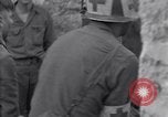 Image of wounded soldier of 8th Infantry Division Brest France, 1944, second 14 stock footage video 65675034896