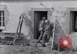 Image of wounded soldier of 8th Infantry Division Brest France, 1944, second 29 stock footage video 65675034896