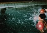 Image of swimming Alaska USA, 1954, second 33 stock footage video 65675034926
