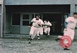 Image of baseball players Fort Richardson Alaska USA, 1954, second 11 stock footage video 65675034977