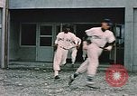 Image of baseball players Fort Richardson Alaska USA, 1954, second 15 stock footage video 65675034977