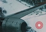 Image of pilot and copilot Alaska USA, 1954, second 20 stock footage video 65675035035