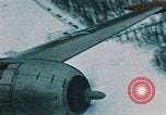 Image of pilot and copilot Alaska USA, 1954, second 21 stock footage video 65675035035