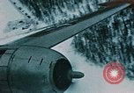 Image of pilot and copilot Alaska USA, 1954, second 22 stock footage video 65675035035