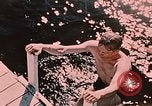 Image of bather Alaska USA, 1954, second 6 stock footage video 65675035048