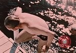 Image of bather Alaska USA, 1954, second 7 stock footage video 65675035048