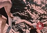 Image of bather Alaska USA, 1954, second 9 stock footage video 65675035048