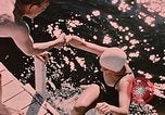 Image of bather Alaska USA, 1954, second 12 stock footage video 65675035048