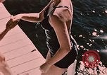 Image of bather Alaska USA, 1954, second 14 stock footage video 65675035048