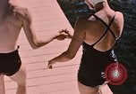 Image of bather Alaska USA, 1954, second 15 stock footage video 65675035048