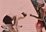 Image of bather Alaska USA, 1954, second 16 stock footage video 65675035048