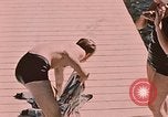 Image of bather Alaska USA, 1954, second 17 stock footage video 65675035048