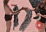 Image of bather Alaska USA, 1954, second 19 stock footage video 65675035048