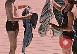 Image of bather Alaska USA, 1954, second 20 stock footage video 65675035048