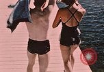Image of bather Alaska USA, 1954, second 23 stock footage video 65675035048