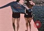 Image of bather Alaska USA, 1954, second 24 stock footage video 65675035048
