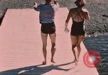Image of bather Alaska USA, 1954, second 26 stock footage video 65675035048