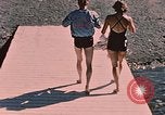 Image of bather Alaska USA, 1954, second 27 stock footage video 65675035048