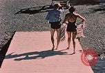 Image of bather Alaska USA, 1954, second 29 stock footage video 65675035048