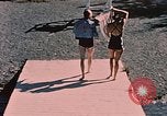 Image of bather Alaska USA, 1954, second 30 stock footage video 65675035048