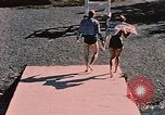 Image of bather Alaska USA, 1954, second 31 stock footage video 65675035048